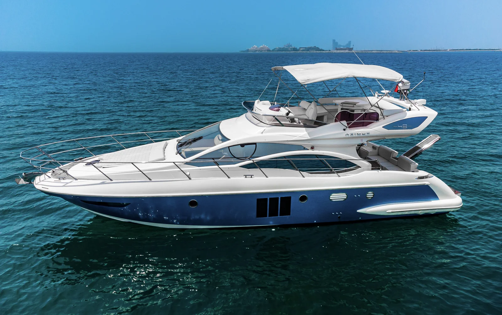 Marinova No Regrets 48 yacht, blue hull Azimut, exterior profile in Dubai